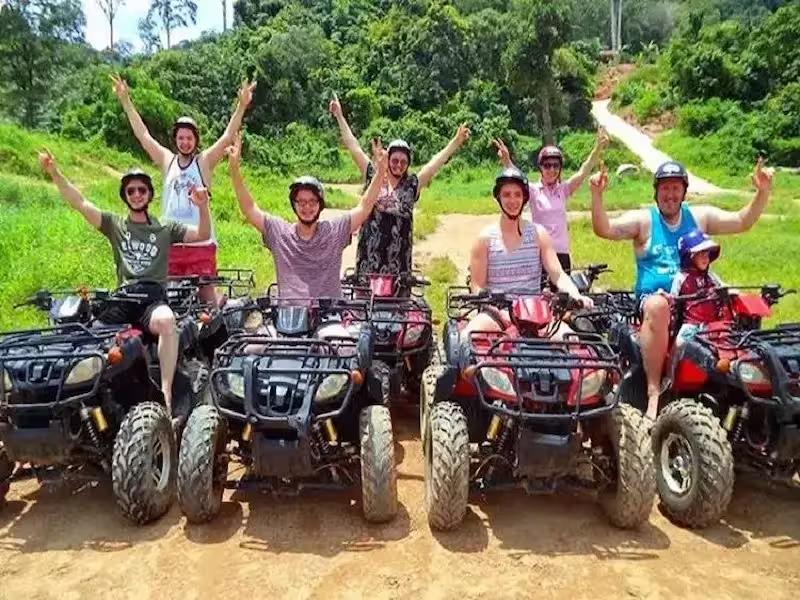 Single rider on an ATV quad bike enjoying a scenic mountain view in Phuket