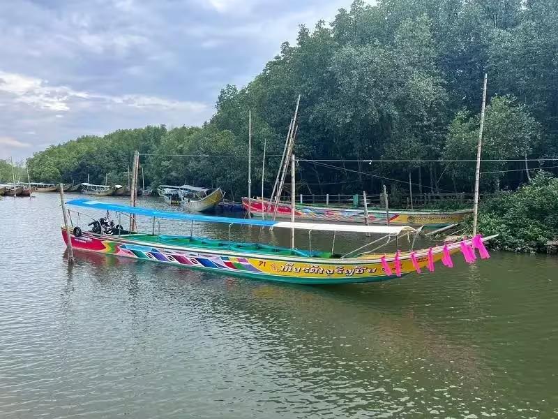 Traditional Thai longtail boat available for private charter tours in Phuket
