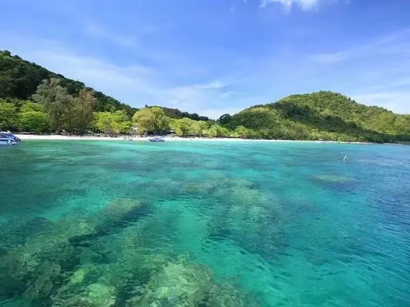 Aerial view of Coral Island Phuket's white sand beach and turquoise water