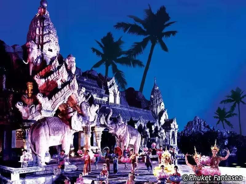 Vibrant Phuket FantaSea theme park at night with colorful lights and attractions