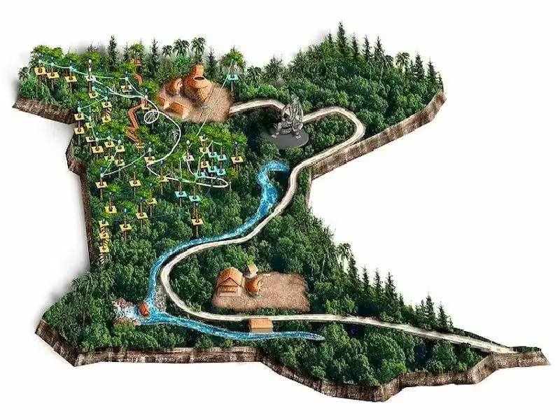 Visitor abseiling (rappelling) down from a tree platform at Hanuman World Phuket