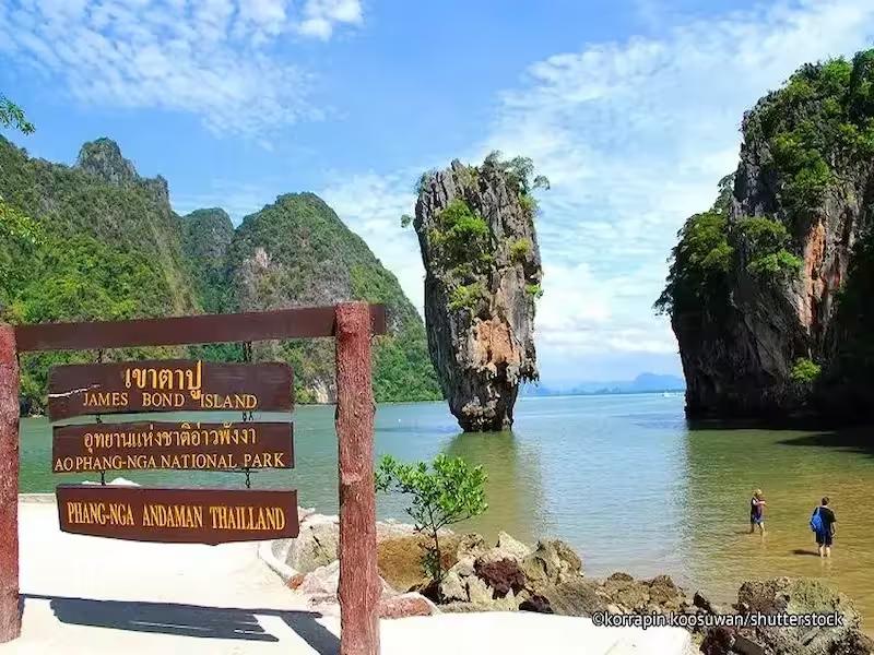 The iconic limestone karst of James Bond Island (Khao Phing Kan) rising from the emerald waters of Phang Nga Bay, Thailand.